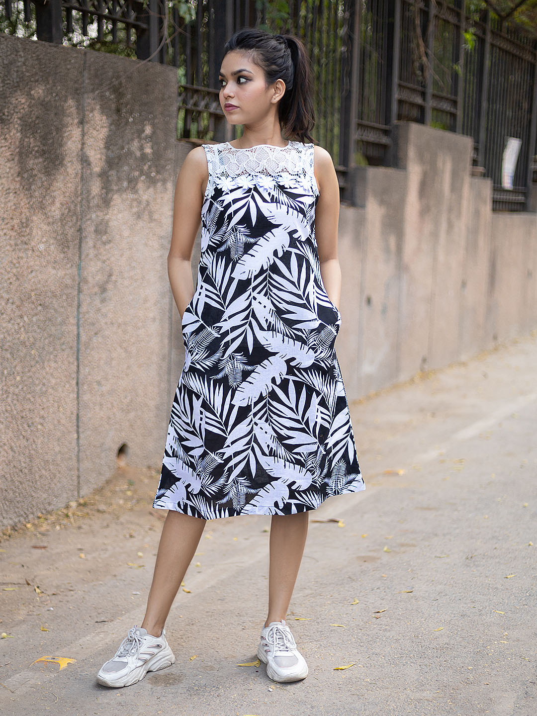 Black and white tropical print shift dress with lace patch