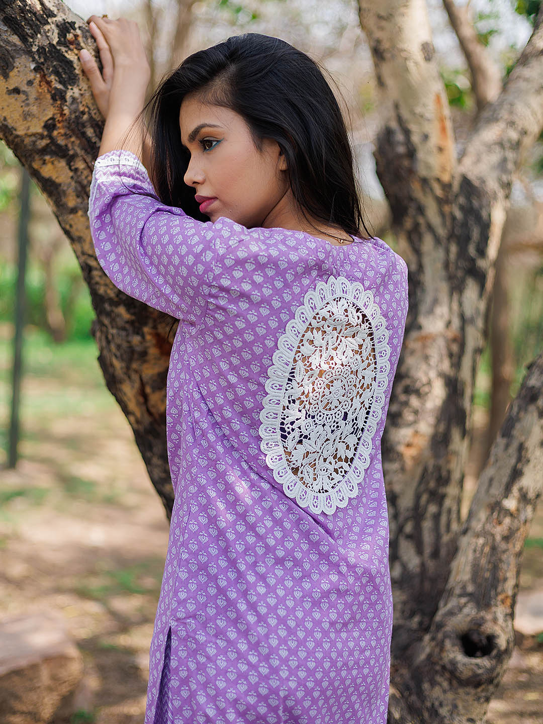 Mauve kurta set with lace details  and sleeves with Back lace patch.